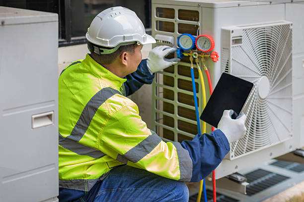 Professional Heat Pump Repair technician working in Dupont, PA